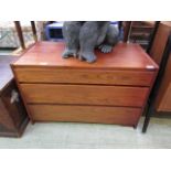 A mid-20th century chest of three drawers