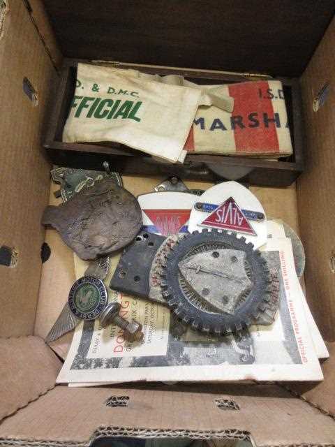 A box containing Grand Prix memorabilia from 1937 to include official armbands, programmes,