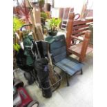 A selection of fishing equipment, folding chairs, etc