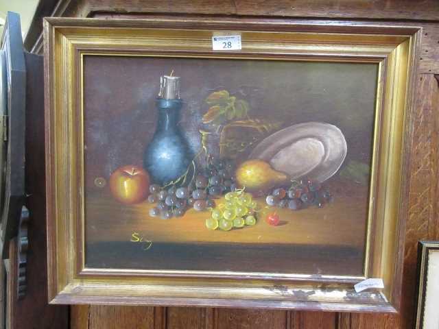 A framed oil on canvas of still life signed Sing