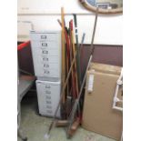 A selection of long handled garden tools