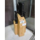 A knife block with kitchen knives