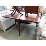 A Georgian mahogany drop leaf table having one leaf