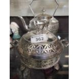 A Victorian silver plated kettle with bone handle together with a plated butter dish with glass