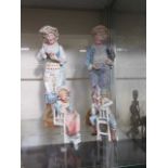 Four continental ceramic figures of young boy and girls