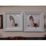 A pair of white framed and glazed modern prints of shoes signed in pencil bottom right