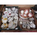 Two trays of ceramic ware to include teacups, saucers, oriental style tea ware etc.