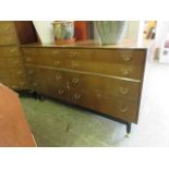 A mid-20th century teak sideboard comprising of eight drawers by G-Plan