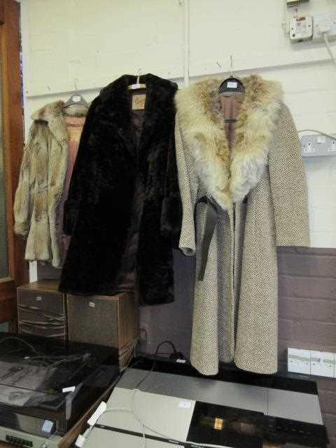 Three fur and tweed coats