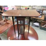 A mid-20th century mahogany inlaid Sutherland table