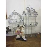 Two wirework wall hanging shelves along with an oriental style figural group