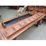 A wooden dough proofing tray