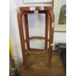 A mid-20th century bent wood stool after Alvar Alto