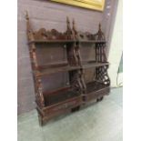 A pair of reproduction Chippendale style wall shelves