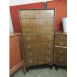 A mid-20th century teak veneered chest of seven drawers by G-Plan