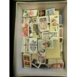 A box of cigarette and trade cards