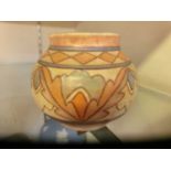 A small mid-20th century ceramic pot by Charlotte Rhead