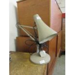 An angle poise style lamp