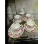 A selection of Royal Worcester cups and saucers with floral design