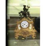 A cast and gilt metal mantle clock by F.L.Hausburg