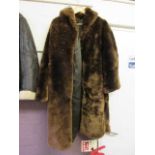 A brown faux fur coat