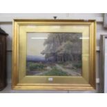 A Victorian gilt framed and glazed watercolour of wooded scene signed bottom right