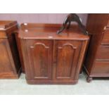 A Victorian mahogany chiffonier base having two doorsMinor knocks and scratches throughout. No