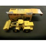 A boxed German die cast model MF66C digger