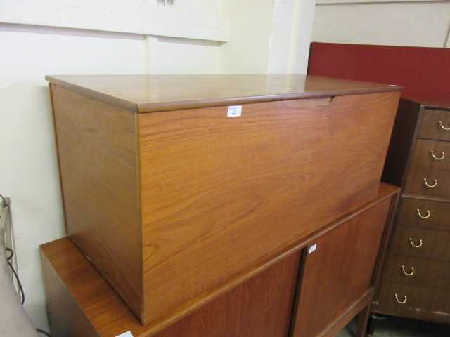 A mid-20th century teak blanket box