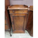 A Victorian mahogany pot cupboard having single drawer above cupboard door