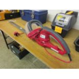 An electric hedge trimmer