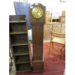 An early 20th century oak cased Westminster chime granddaughter clock