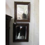 Two early 20th century mahogany framed bevel glass mirrors