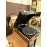 A Columbia gramophone player along with a selection of 78RPM records