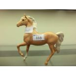 A Beswick ceramic model of palomino horse