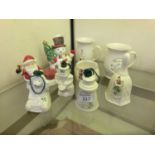 A selection of Belleek ceramic items mostly relating to Christmas to include ceramic snowman,
