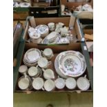 Two trays containing Indian Tree design tableware to include cups, saucers, teapots, etc