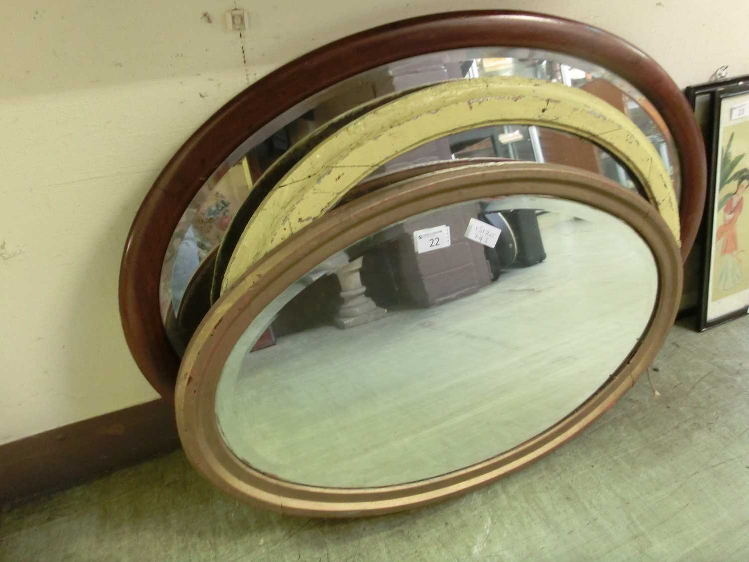 Three oval mirrors