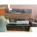 A Pioneer turntable, Marantz integrated stereo amplifier, and a Realistic tape deck