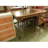 A mid-20th century oak desk, the top over three side drawers along with a stool (A/F)