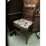 An 18th century oak framed single chair