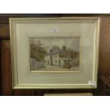 A framed and glazed watercolour of cottage scene