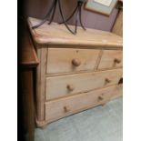 An early 20th century pine chest of two short over two long drawersStains, knocks and scratches to