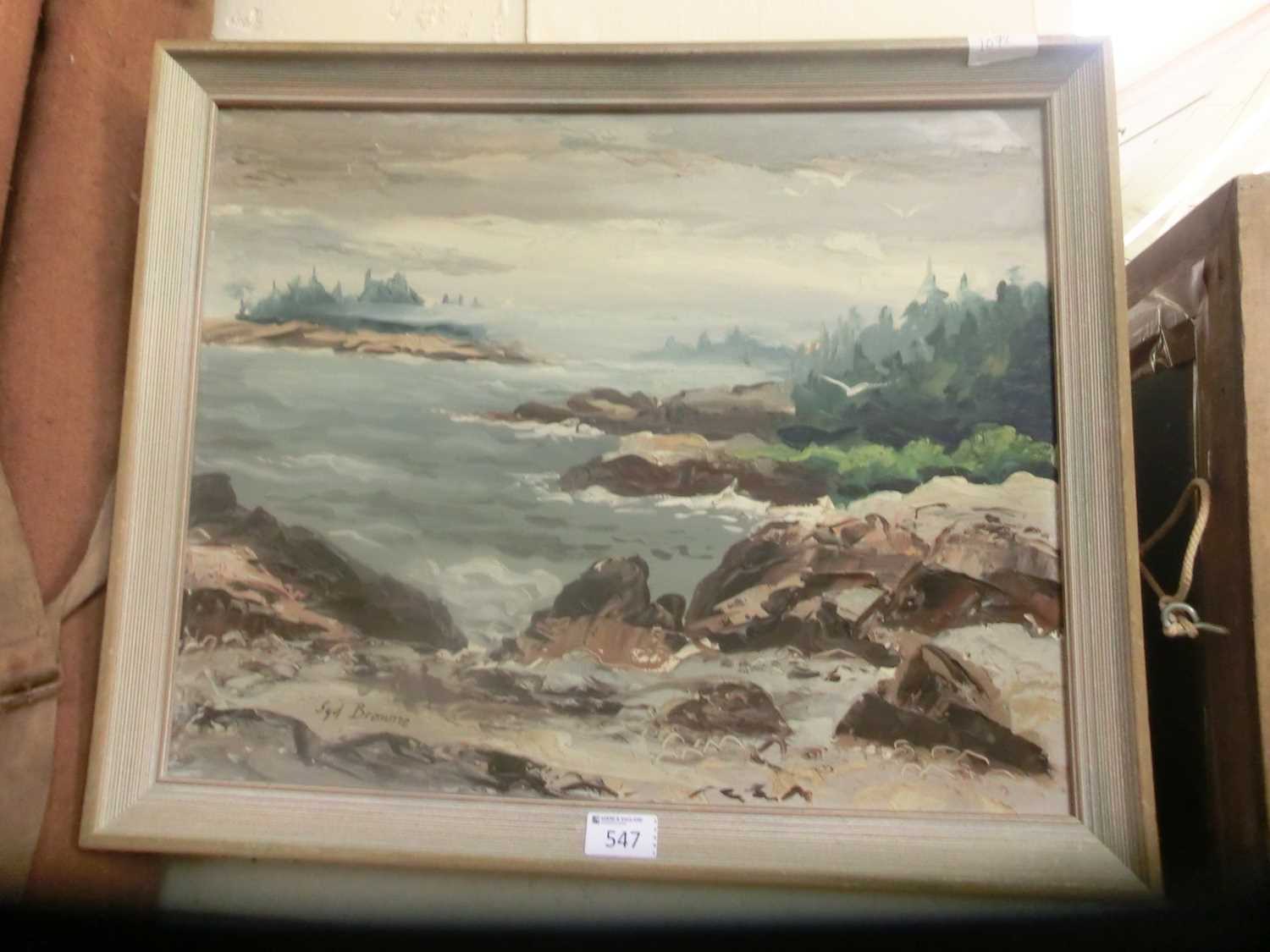 A framed oil on board of coastal scene signed Sid Browne