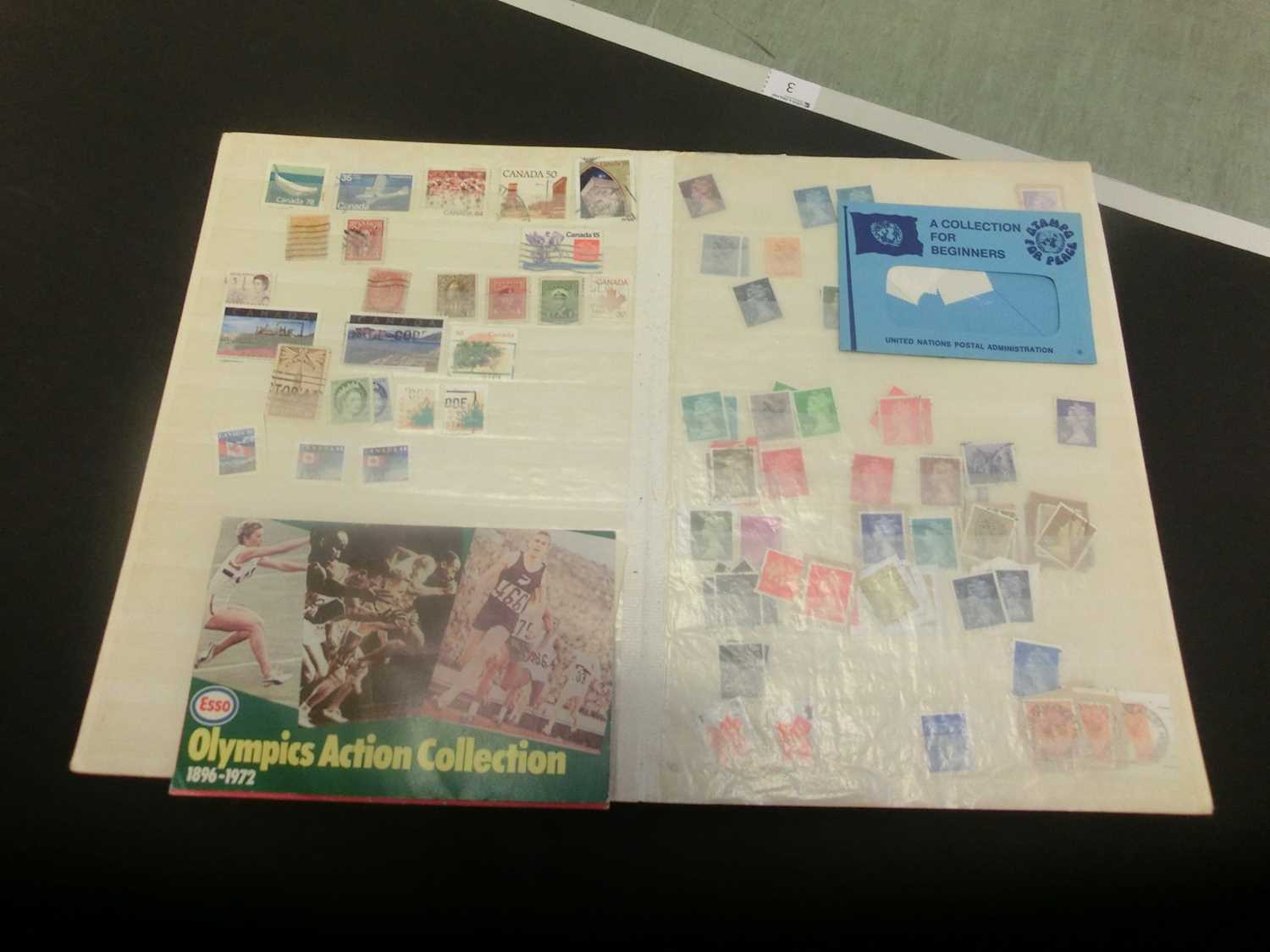A stamp album containing a quantity of stamps