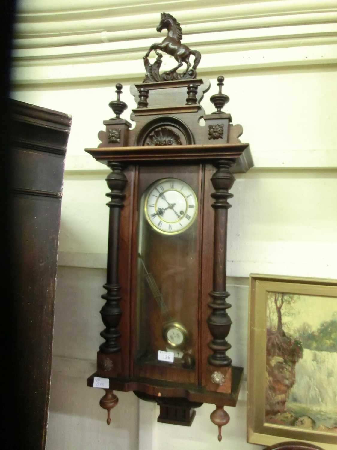 An early 20th century walnut cased Vienna style drop dial wall clock (Vendor states the clock is