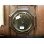 An early 20th century oak framed barometer