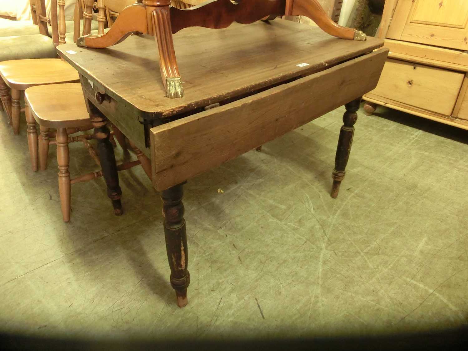 A 19th century pine kitchen table