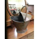 A copper coal bucket