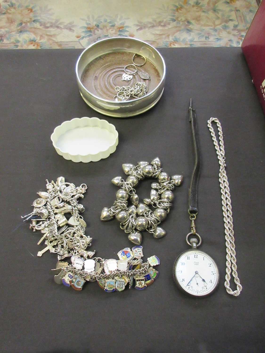 A box containing a quantity of white metal jewellery, a pocket watch, etc